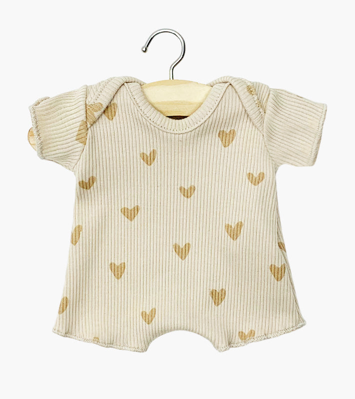Ribbed knit shorty bodysuit with small beige hearts by Minikane