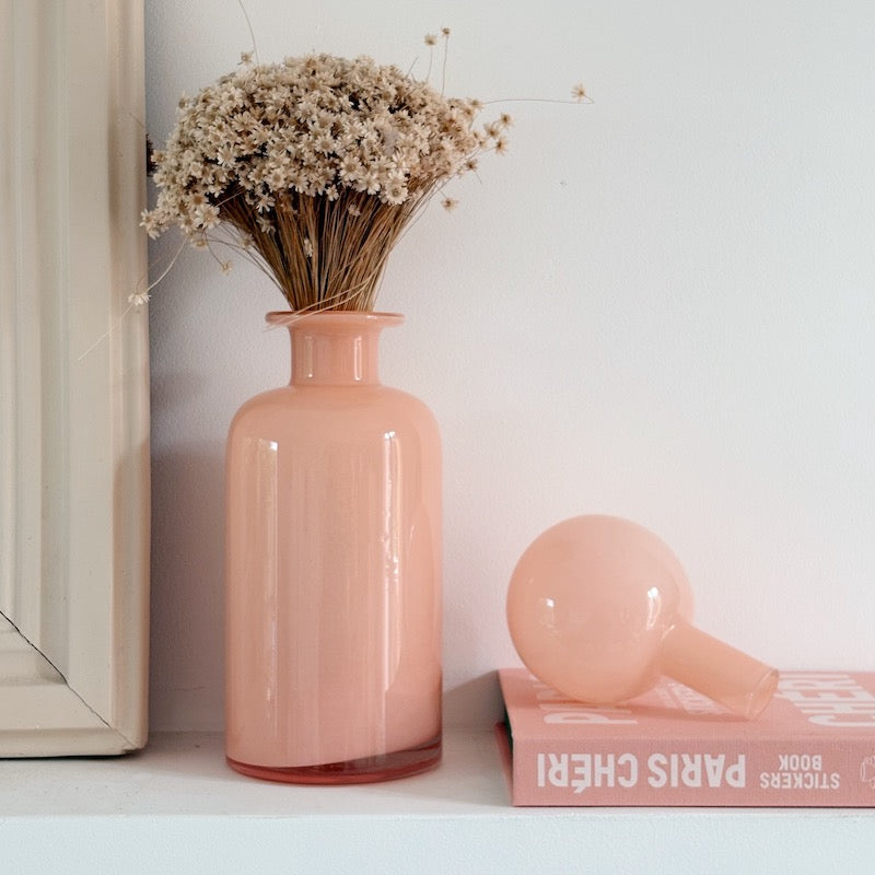 Bottle with pink glass stopper