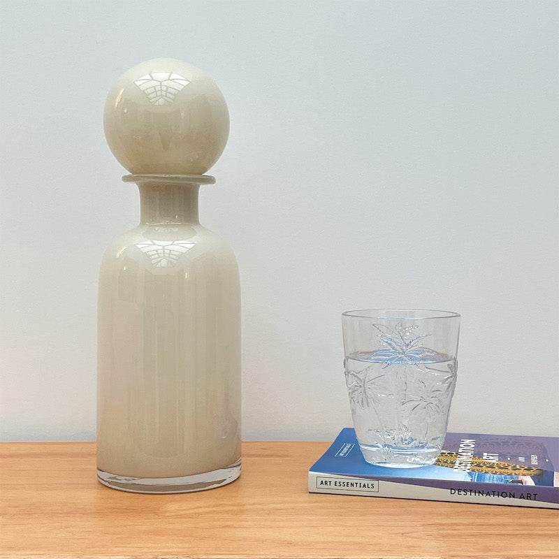 Bottle with light beige glass stopper