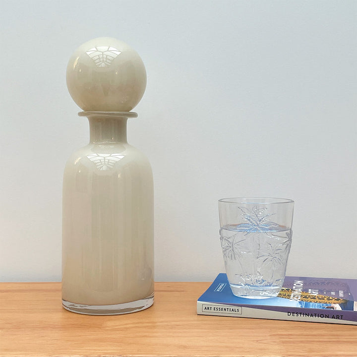Bottle with light beige glass stopper