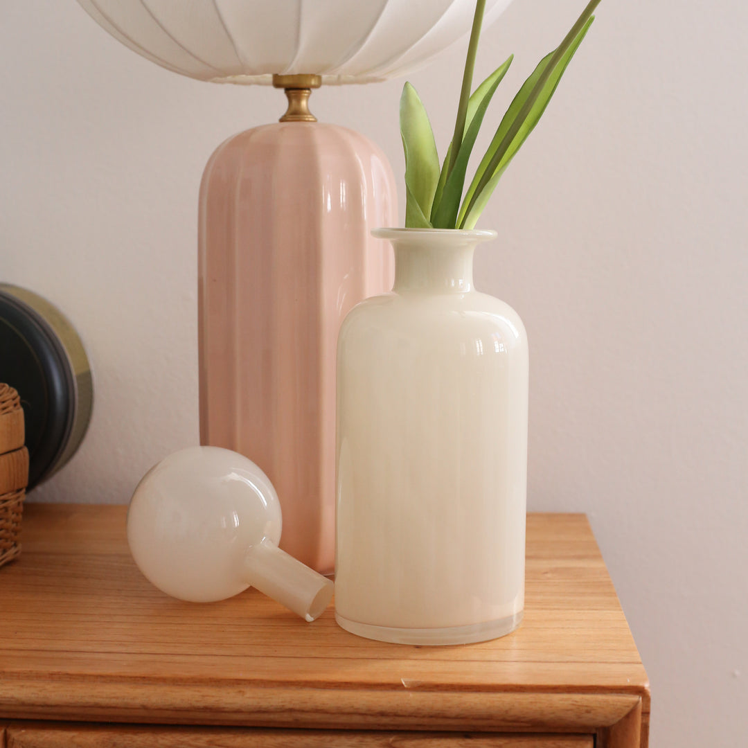 Bottle with light beige glass stopper