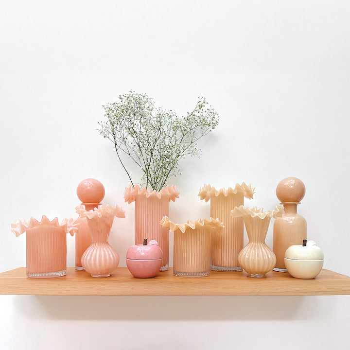 Bottle with rosé champagne glass stopper
