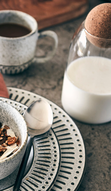 Glass carafe with round cork stopper