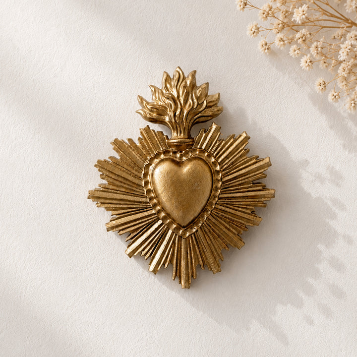 Small gilded ex-voto heart