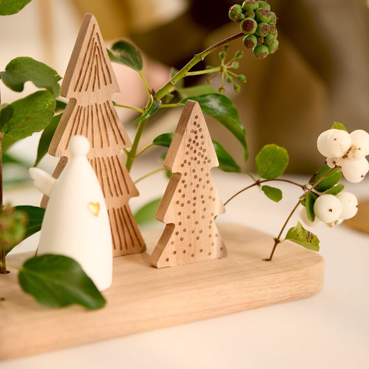 Scène de Noël ange porcelaine et sapins Räder