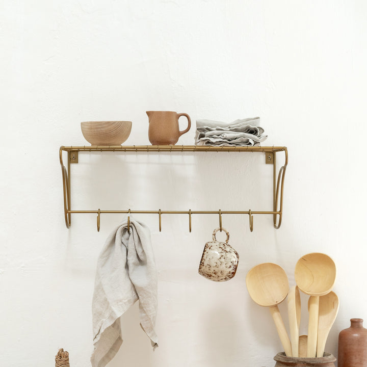 Etagère en métal doré "Madam Stoltz"