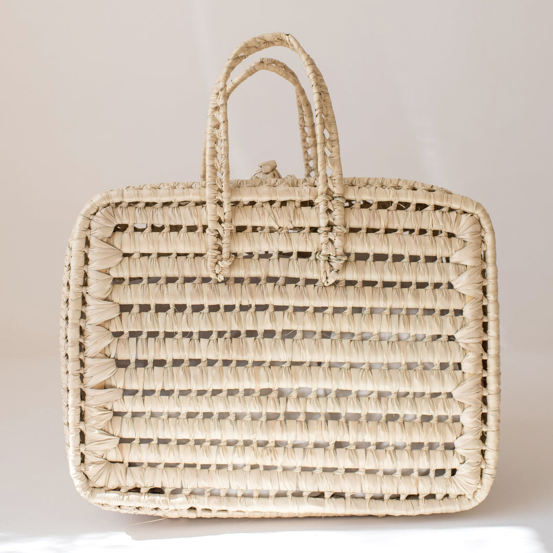 Grande valise en feuilles de palmier