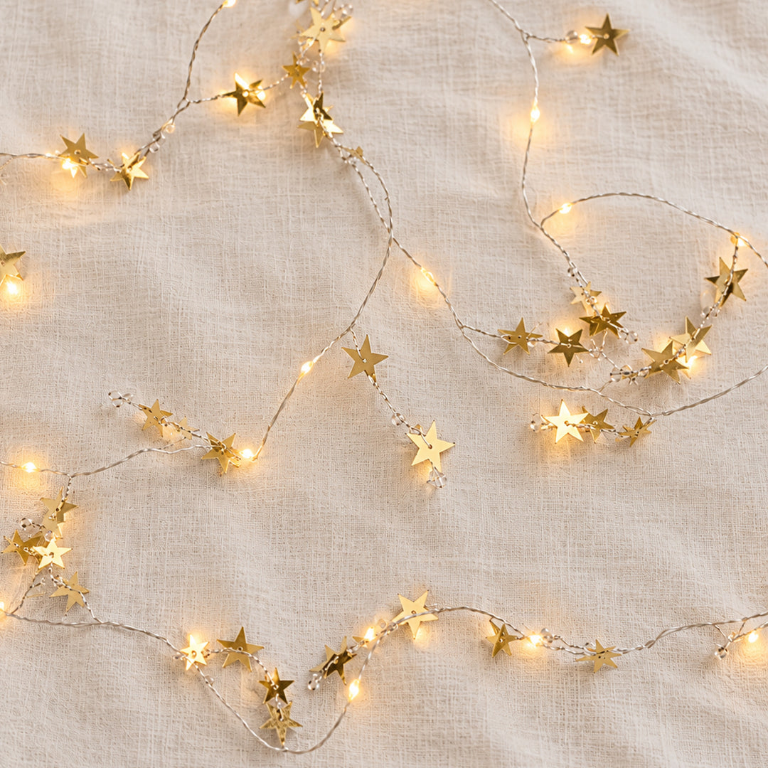 Guirlande lumineuse avec étoiles en laiton