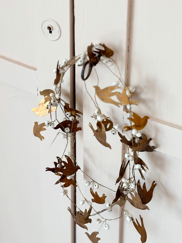 Swallow and pearl garland