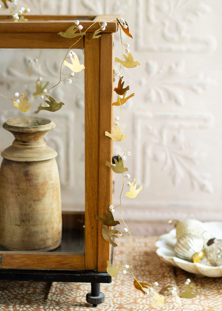 Swallow and pearl garland