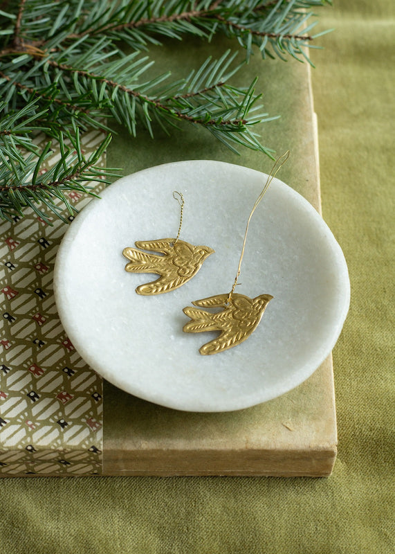 Small hammered brass swallow for hanging