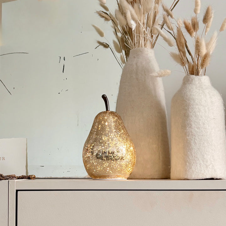 Aged gold glass pear-shaped LED bulb