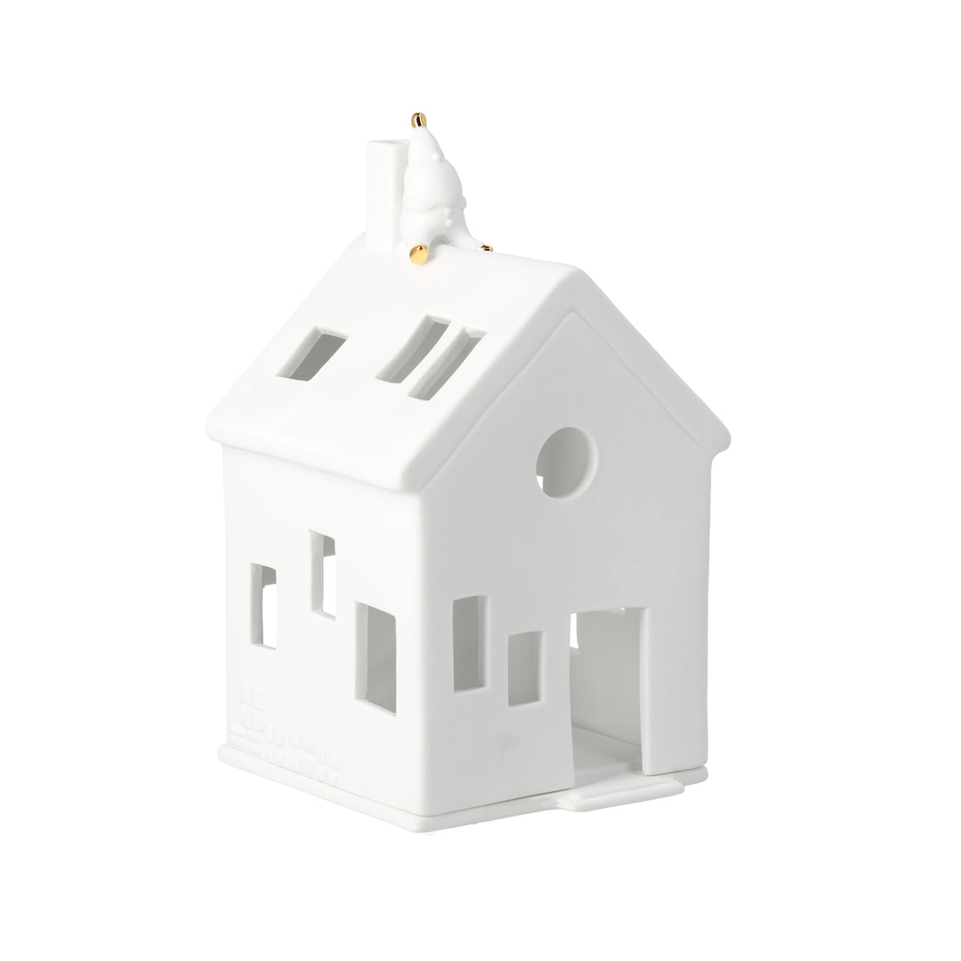 Maison avec père Noël sur le toit