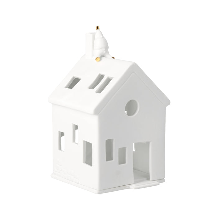 Maison avec père Noël sur le toit