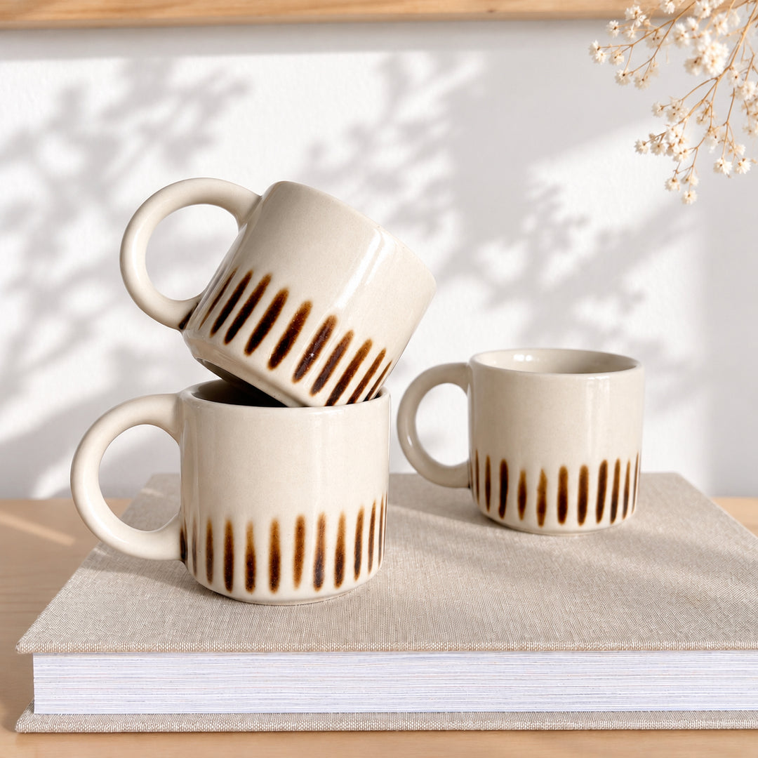 Mug en céramique crème à rayures caramel