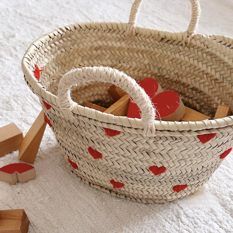 Basket with embroidered red hearts