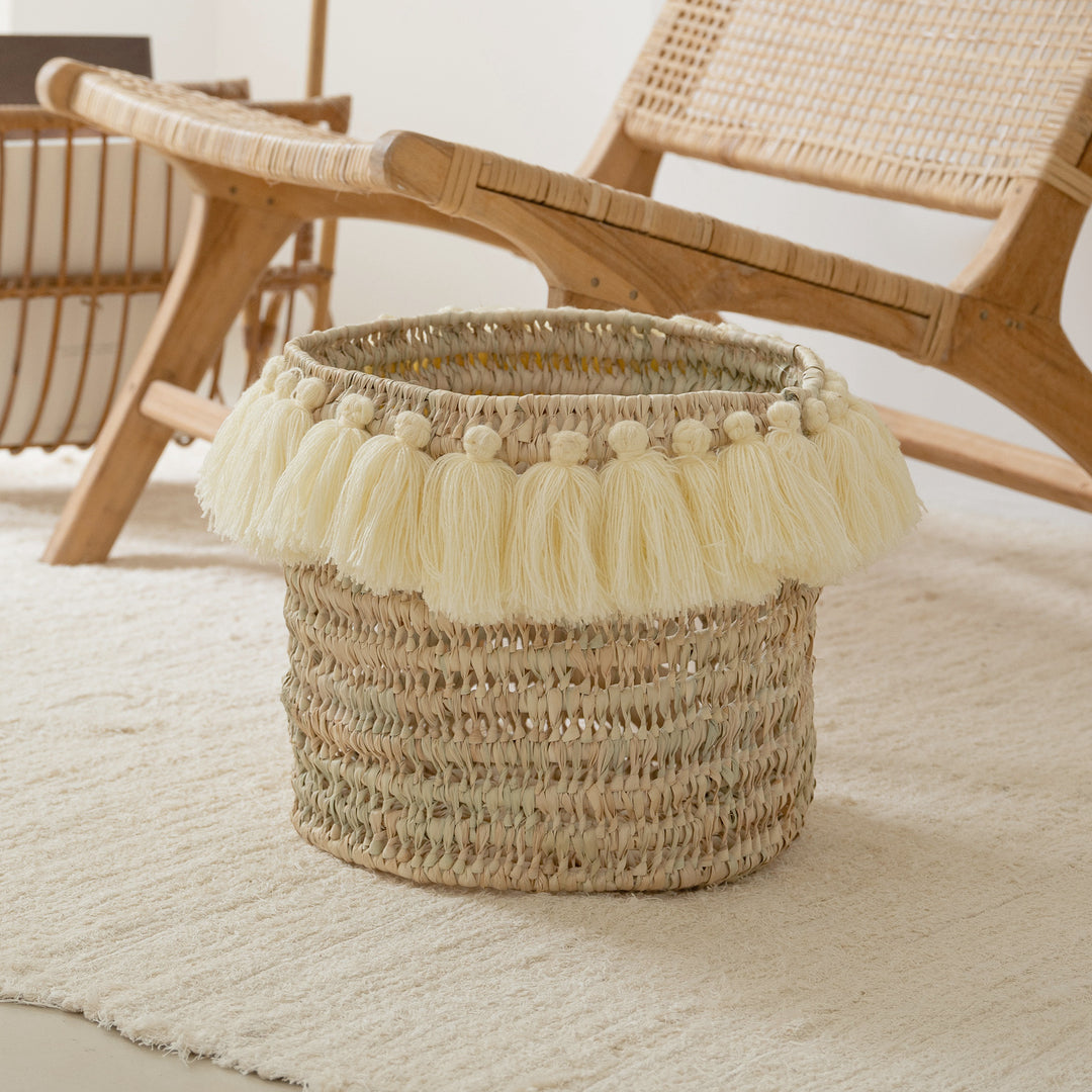 Round basket with pompom tassels