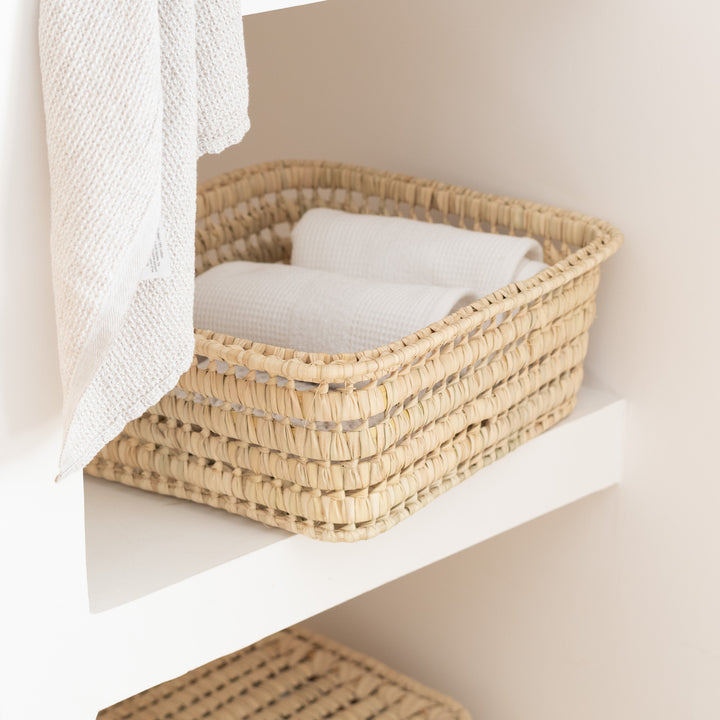 Grande caisse avec rebord en feuilles de palmier