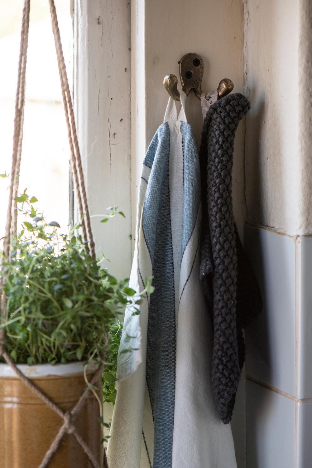 Small gold-plated double coat hook