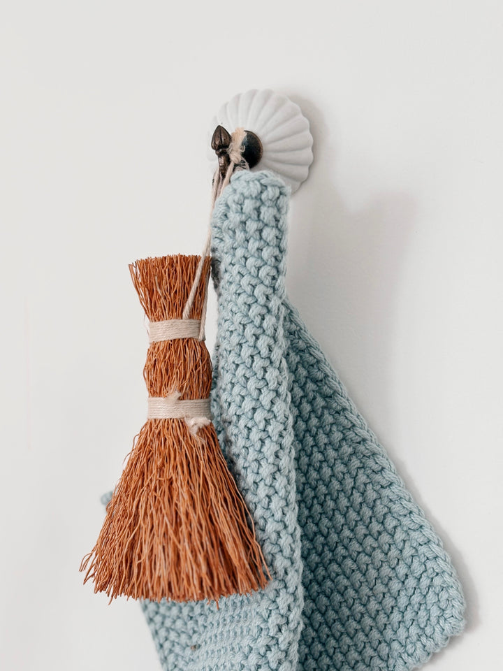 Perchero pequeño redondo de cerámica blanca