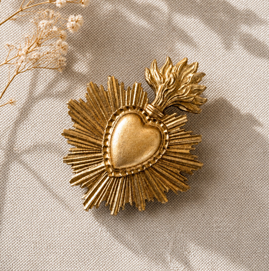 Small gilded ex-voto heart