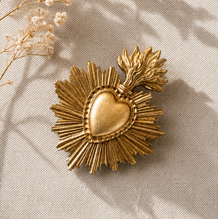 Small gilded ex-voto heart