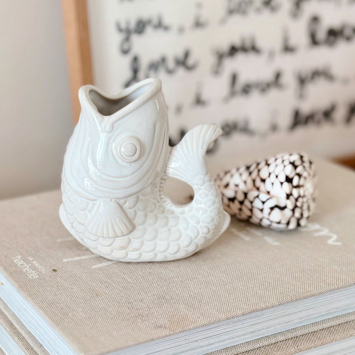 Small white ceramic fish vase