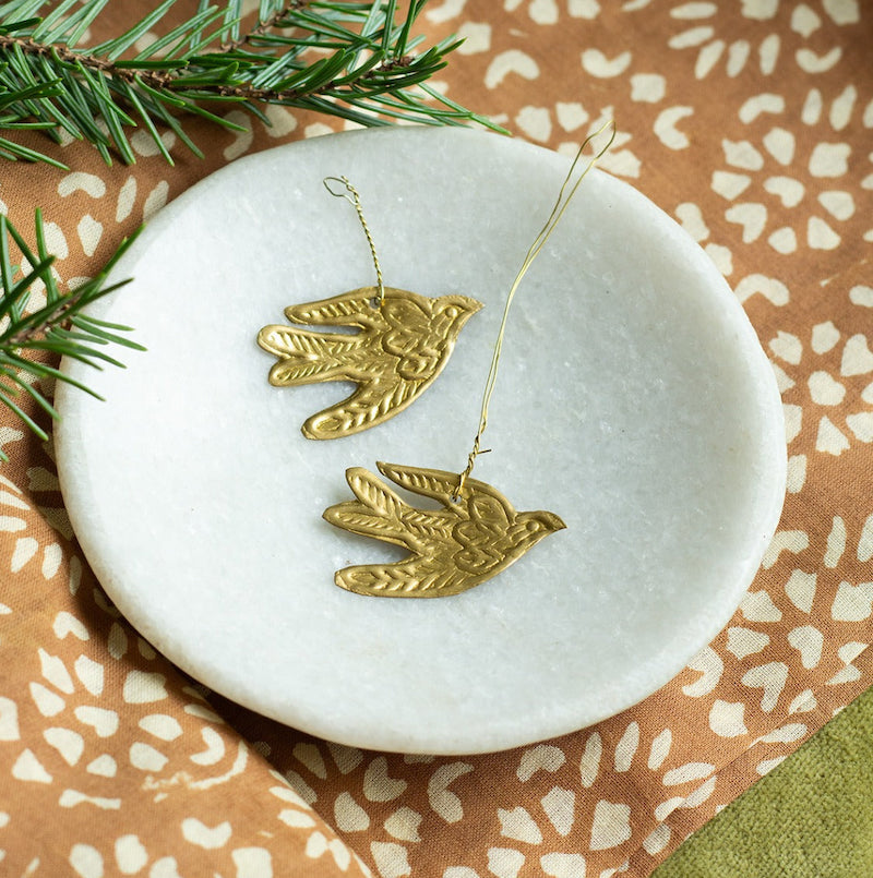 Small hammered brass swallow for hanging