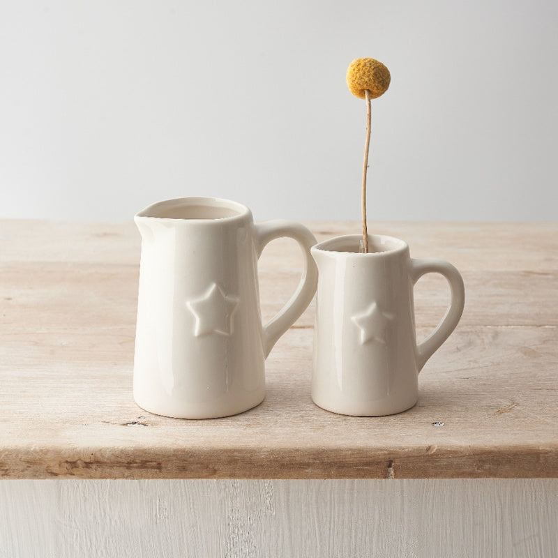 White pitcher with star
