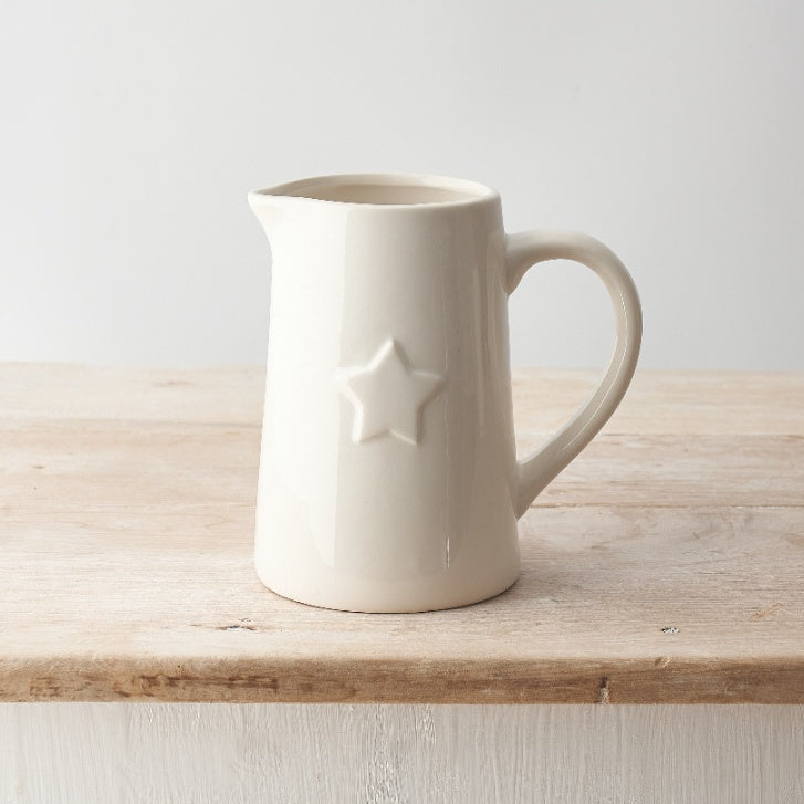 White pitcher with star