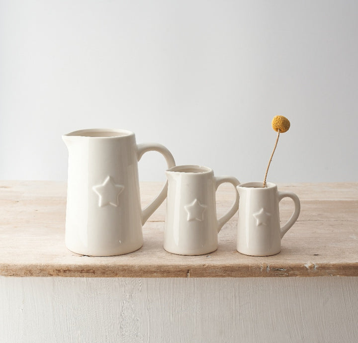 White pitcher with star
