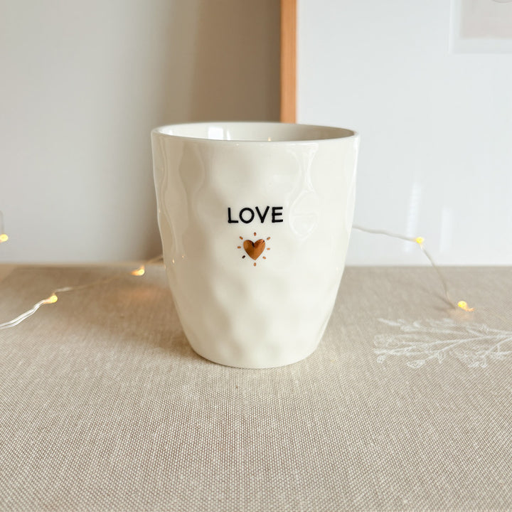 Mug with gold heart design and "Love" inscription