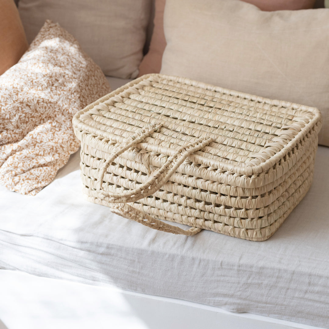 Grande valise en feuilles de palmier